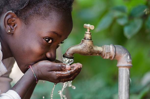 Community members collecting water in rural Ghana, where the Water for Life project is planned